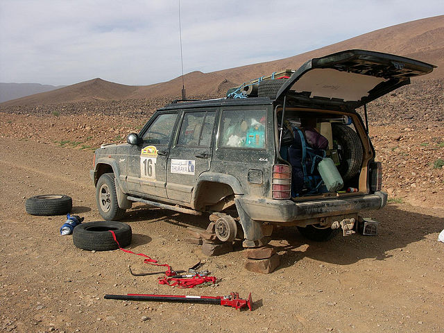 Repairing Tyre in desert